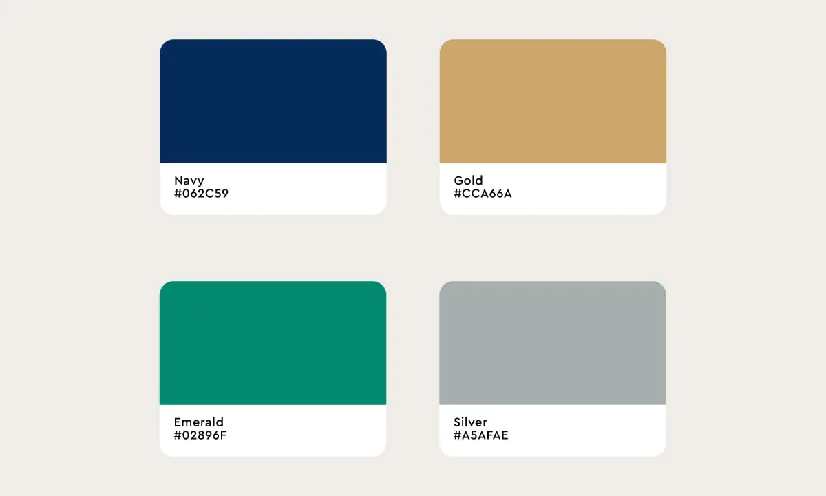 Brand color palette: navy, gold, emerald and silver